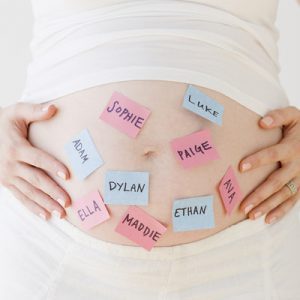 Pregnant Belly with Post-It Notes of Baby Names