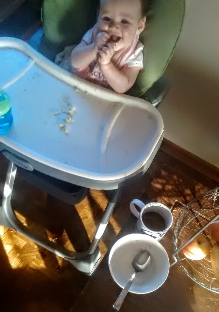 Note the empty cereal bowl and full cup of coffee-- Momma's gotta eat too!