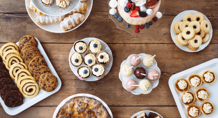 sweet treats displayed on wooden table